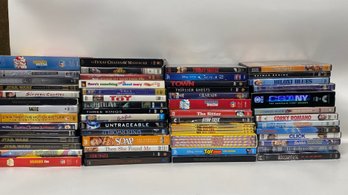55 Assorted DVDs - Mixed Types