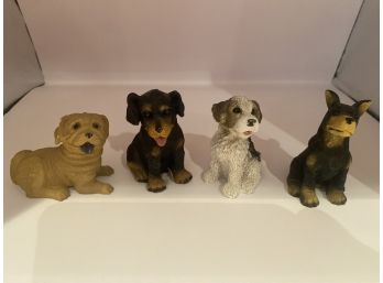 Four Dog Figurines
