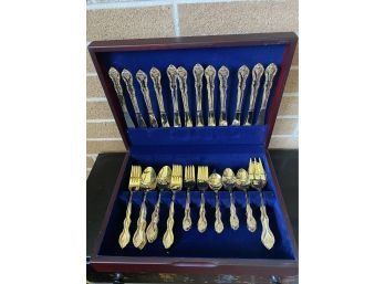Gold Colored Stainless Flatware Set W/ Case