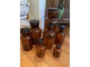 Lot Of 7 Amber Colored Bottles