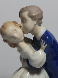 Bing And Grondahl  Figurine Depicting A  Girl Being Kissed By Young Man