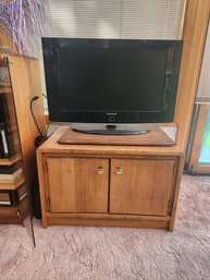 Flat Screen Television And Television Stand