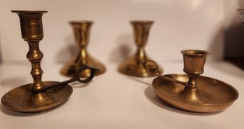 Pair Of Brass Candle Holders And Two Brass Chamber Sticks