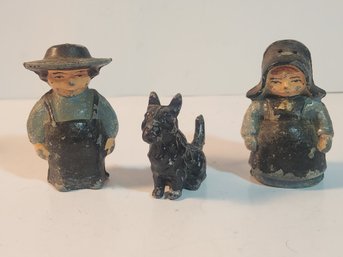 White Metal Dog And Amish Couple Salt And Pepper Shakers