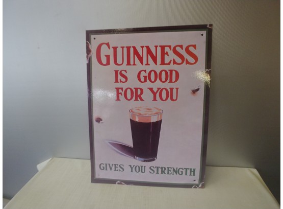 Guinness Beer Advertising Sign With Gives You Strength Logo