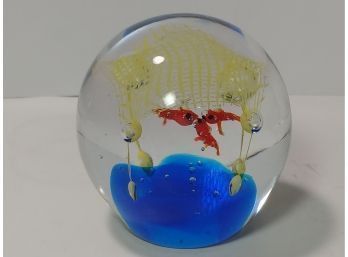 Hand Blown Glass Paperweight With Fish Under Net