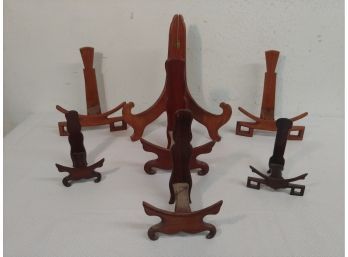 7 Assorted Rosewood And Other Wooden Plate Stands