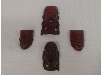 Four Miniature Carved Chinese Rosewood Masks