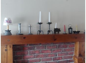 Pair  Of Wrought Iron Candle Sticks With An Assortment Of Tin Lighting
