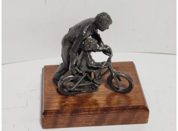 Pewter Figure Of Man Teaching His Son To Ride A Bicycle