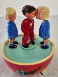 Rotating, Vintage Toy With Magnetic Kissing Couples