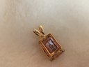 14k Gold Pendant With Topaz