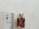 14k Gold Pendant With Topaz
