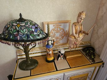 Lamp And Items On Shelf