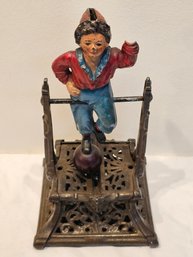 Boy On Trapeze Mechanical Cast Iron Bank