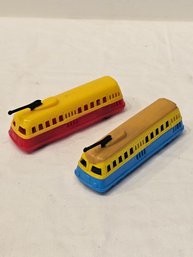 2 Acme Plastic Toy Buses