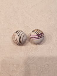 2 Hand Painted Clay Marbles