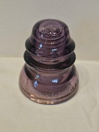Purple Glass Electrical Insulator