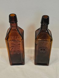Pair Of Doyle's Hops Bitters Bottles