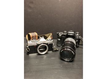 Two Minolta Cameras