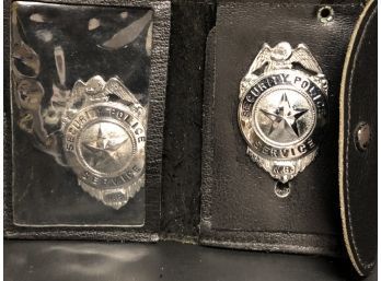 Two Security Police Service Badges