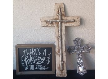 One Metal Cross With A Larger Cream Colored Resin Cross With A Small Inspirational Plaque