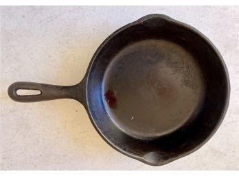 An 8' Cast Iron Skillet Marked 5 Made In The USA