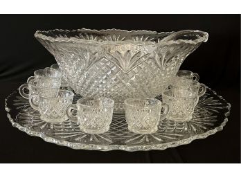 A Spectacular Large Cut Crystal Glass Punch Bowl With 12 Glasses, Ladle And Base