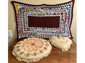 A Small Crocheted Lap Blanket With 2 Vintage Embroidered Pillows