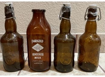 Vintage Beer Bottles With A Darigold Bottle