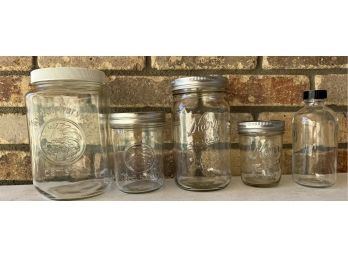 A Misc Grouping Of Kerr And Ball Mason Jars With A Golden Harvest Cannister