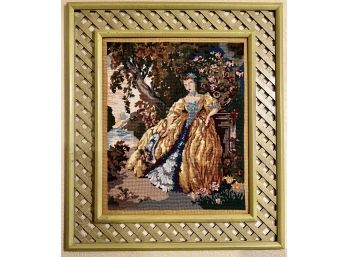 A Fabulous Needlepoint Art Of A Woman In A Garden In A Very Nice Green Lattice Frame