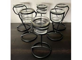 A Variety Of 6 Black Tea Light Holders With Glass Cups