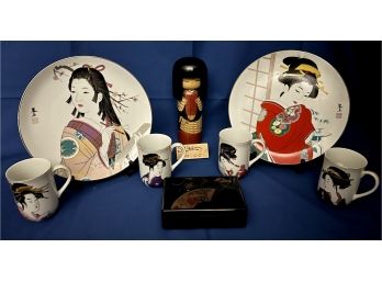 Gorgeous Collection Of Geisha Themed Items, Incl. 2 Plates, 4 Cups & A Wooden Doll & More
