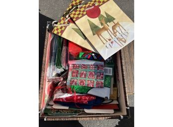A Box Of Holiday Gift Wrapping, Bags, Boxes And More