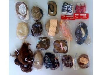 A Collection Of Doll Wigs And Shoes