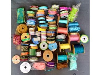 A Collection Of Used Ribbon In Various Colors And Sizes