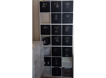 A Very Handy Organization Shelving Unit With Black Mesh Boxes For Storage