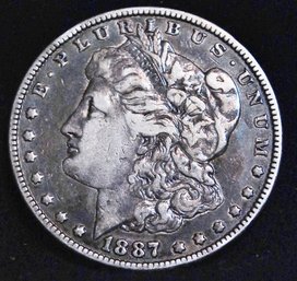 1887 Morgan Silver Dollar  F / VF Nice Tone   (8dan3)