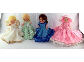 4 Vinyl Dolls With Crocheted Dresses