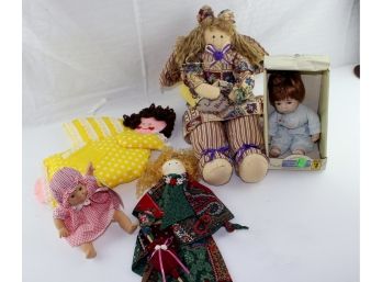 5 Misc - 1 Bean Bag Palm Pal, 1 Embroidered Face, 3 Cloth Dolls