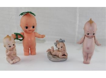 Lot Of 4 Kewpie Dolls, 6 Inch Rose O'Neill Bisque Signed On Foot, Plastic Kewpie With Damage On Back