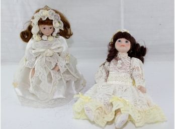 Two Small Bisque Dolls One Is A Music Box