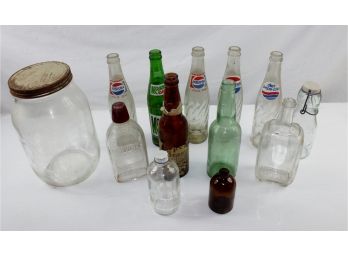 13 Misc Bottles – 1 Gallon Jar,  Dr. Pepper, 2 Pepsi, 1 Mountain Dew, Columbia Brewing Company, Beer Bottle