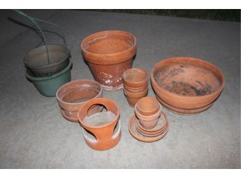 Multiple Clay Pots With Trays And 2 Plastic Pots