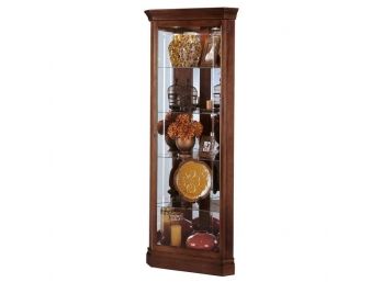 Elegant Corner  Curio Cabinet With Light, Cherry Wood  25'W 19'D 72'H  Made By Howard Miller