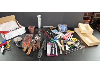 Kitchen Misc Lot- Knives, Red Handled Utensils, Corn Cob Holders, New Nut Cracker, Glue Gun, Pizza Cutter