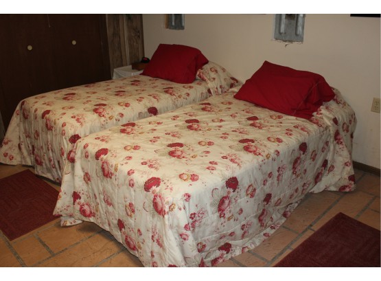 Two Single Beds And Frames With Bedding