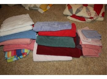 Multiple Mismatched Towels And Rags