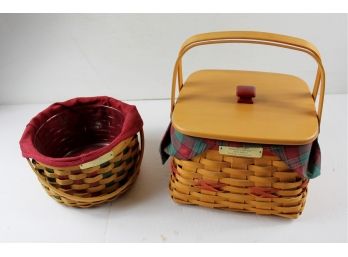 2 Longaberger Baskets, One 7.5 Diameter With Liners And One 8.2 5 X 9 With Liner Lid And Plastic Divider